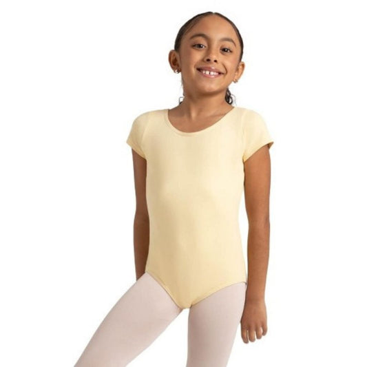 Young girl wearing a yellow leotard on a white background