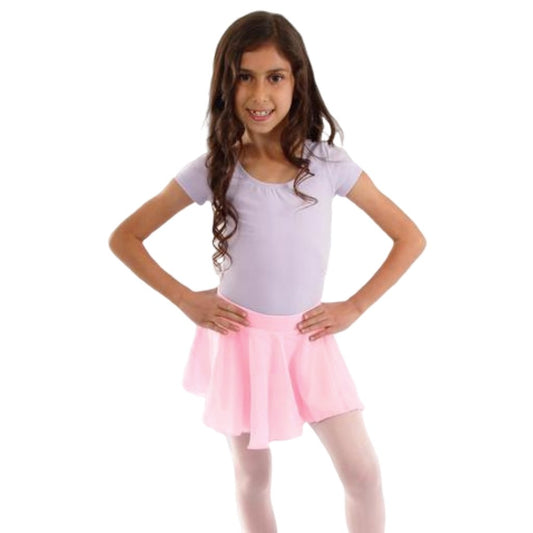 Young girl wearing a light purple leotard and pink skirt on a white background