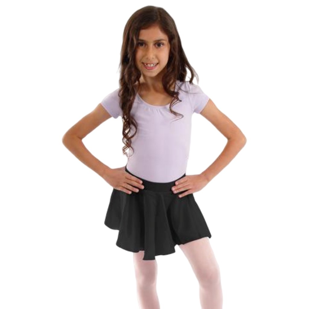 Young girl wearing a white top and black skirt on a white background